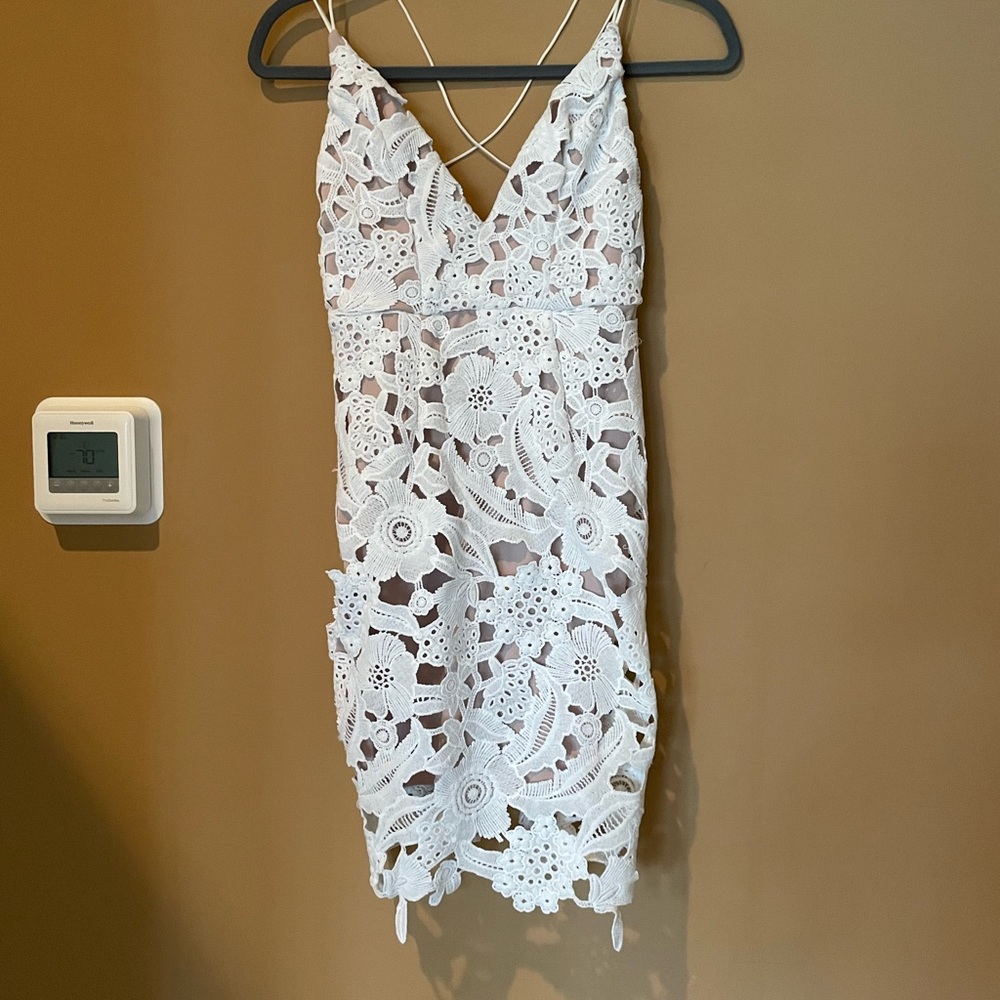 White with nude underlay.  Size small
